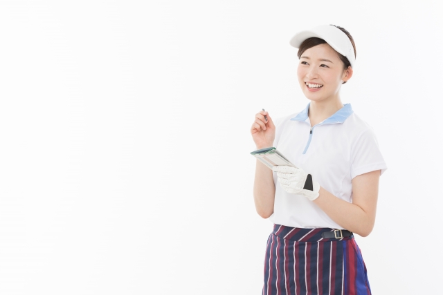ゴルフウェアを着た女性。